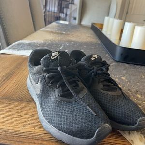 Blacked out Nike Tennis shoes (Size 9.5)